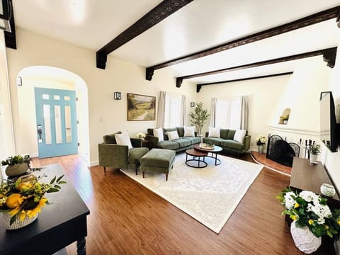 Spacious living room with exposed beams
