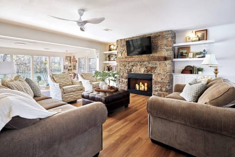 The Main Living Room is built so that you can relax, crash on the super comfy couch, rotate the chairs around to watch the river, or just watch a movie. Its all there for you in this room.