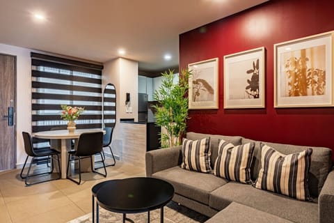 Cozy living room with a pop of color, perfect for unwinding after a day out.