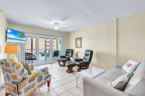 Bright and Open Living Area with Balcony Access
