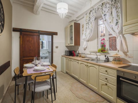 Furniture, Interior Design, Flooring, Wood, Cabinetry, Ceiling, Countertop, Kitchen, Floor, Room