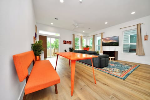 Bright modern living room with bold decor and plenty of natural light