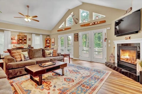 Upstairs Living Room with TV and Fireplace 
