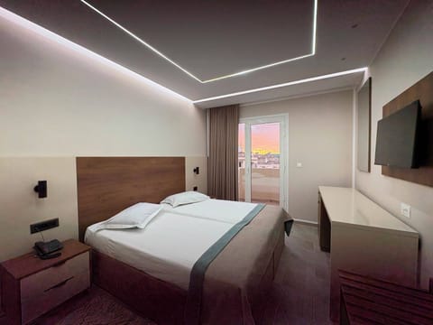 Deluxe Double Room, City View | Minibar, desk, laptop workspace, WiFi (free)