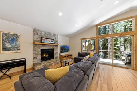 Sink into plush seating by the warm fireplace, enjoy your favorite show, then step onto your private balcony surrounded by towering pines and mountain tranquility.