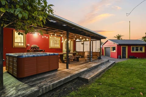 Rear deck and garage at sunset