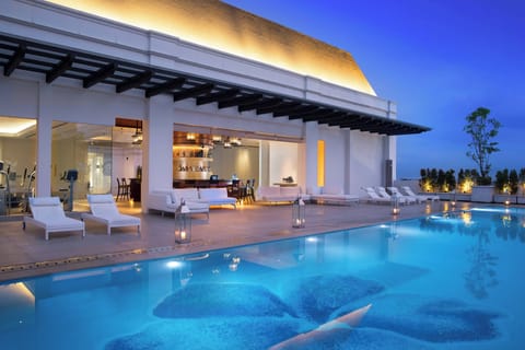 Outdoor pool, open 6:00 AM to 9:00 PM, sun loungers