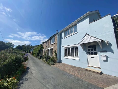 The Malthouse (blue cottage in foreground at end of row), situated in the beautiful, peaceful rural hamlet of West Buckland, less than 1 mile from Bantham Beach