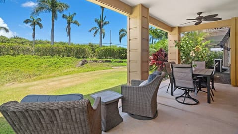 Your private lanai opens to lush tropical gardens and swaying palms, perfect for morning coffee or sunset relaxation in island comfort.