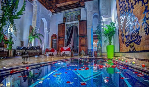 Indoor pool, outdoor pool, pool umbrellas, sun loungers