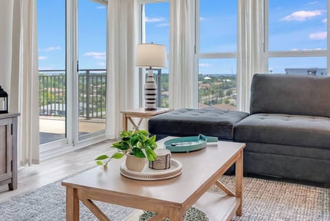 Gorgeous bright living room with access to balcony and views all around