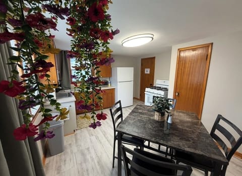Dining table, gas oven, fridge/freezer, microwave, coffee maker, and more!