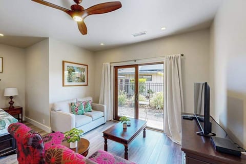 Bright Studio Living Space with Seating Area & Sliding Patio Doors