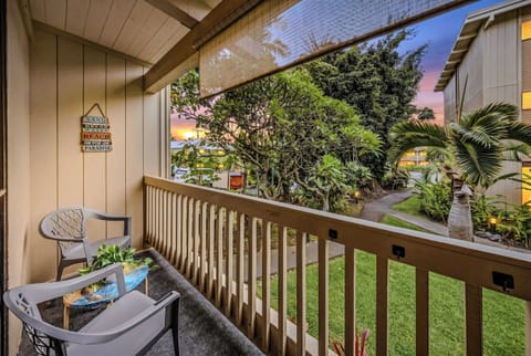 Relax on the covered lanai surrounded by tropical greenery.