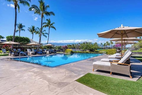 Relax by the resort-style pool under tropical skies