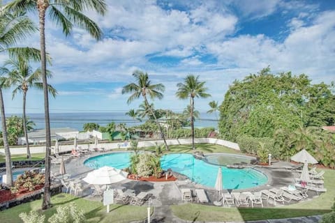 Elevated View of Resort Swimming Pool Complex & Ocean Background