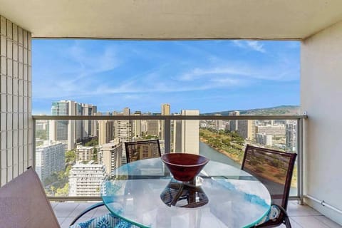Enjoy outdoor dining on the private balcony overlooking Honolulu and the scenic Ala Wai Canal.