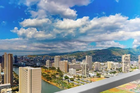 Sip your morning coffee against a spectacular backdrop of blue seas and towering mountains.