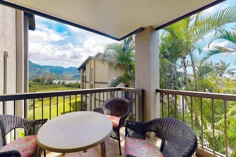 Enjoy outdoor dining and refreshing breezes from this covered balcony