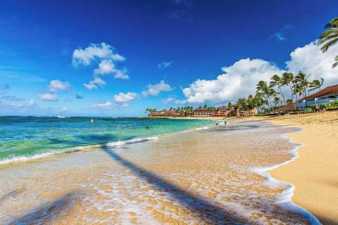 Take a stroll along the white sandy beaches as you listen to the waves crash on the shore.