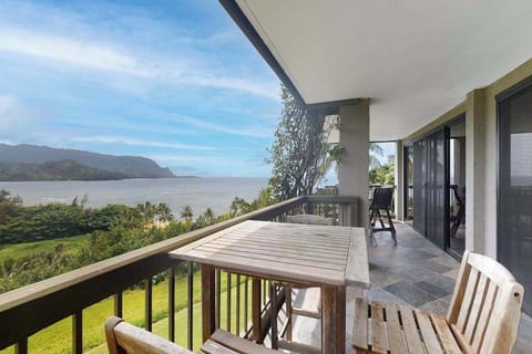 Enjoy outdoor dining while admiring sweeping mountain and tropical views