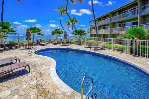 Relax beside the sparkling resort swimming pool