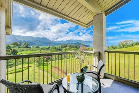 Sip morning coffee while enjoying peaceful mountain views from balcony
