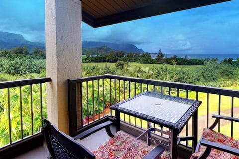 Enjoy morning coffee outside while admiring sweeping tropical island views