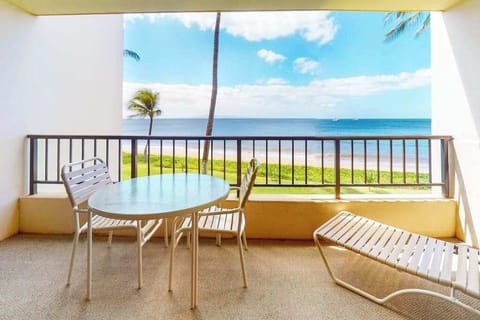 Views of the turquoise waters of the Pacific Ocean washing up on the white sandy beaches while the palm trees sway in the wind from your private lanai.  Relax in your chaise lounger or enjoy your morning coffee at your table and chairs.