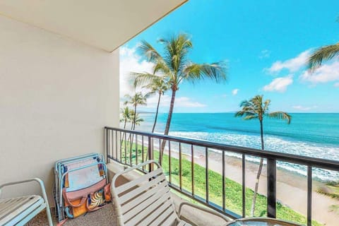 Relax on your private lanai and enjoy views of Maui's white sandy beaches, just steps from the ocean. The perfect spot for morning coffee, sunset drinks, or simply soaking in the island beauty.