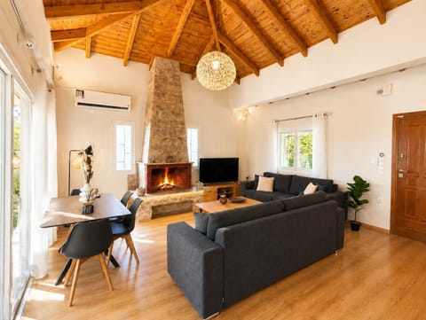 Bright living room with vaulted ceiling.