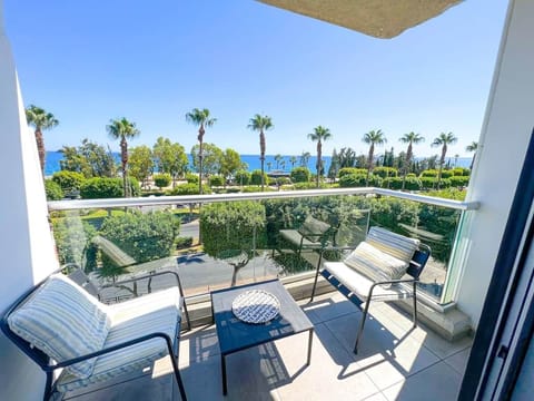 Enjoy a glass of wine and the sunshine from our amazing balcony overlooking the Mediterranean sea