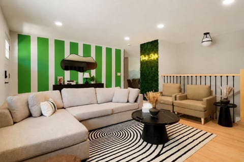 Welcome to the unofficial headquarters of your vacation. From morning coffee to late-night laughs, this living room is ready for every memorable moment.