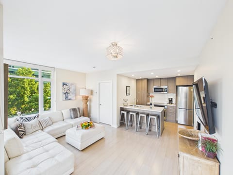 Welcome to your chic urban sanctuary in downtown Victoria, featuring a bright, open-concept design.