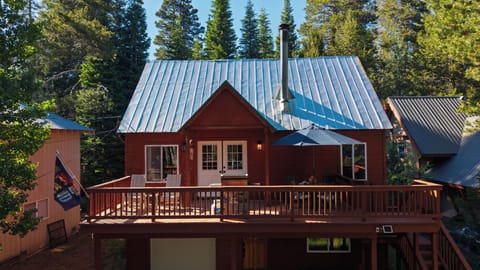 Welcome to your dream mountain escape! This charming rustic cabin features an expansive wrap-around deck perfect for outdoor relaxation.