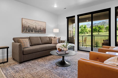 Gather in the bright living room after a day of skiing, hiking, or golfing. and enjoy the mountain views.