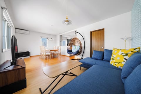 Apartment | Living area | 43-inch flat-screen TV with digital channels
