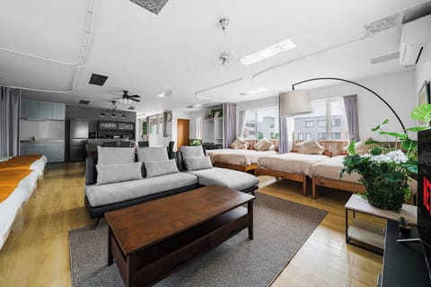Apartment | Living area | 50-inch flat-screen TV with digital channels