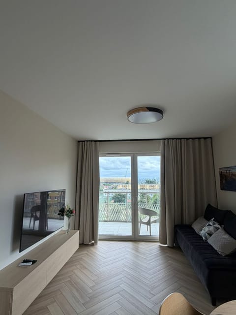 Deluxe Apartment, Balcony | Living area
