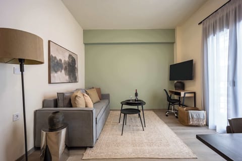 Bright living area with sofa, coffee tables, and balcony light creating relaxed evenings indoors perfect.