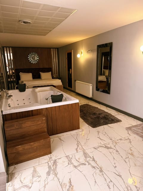 Luxury Suite, City View | Desk, laptop workspace, WiFi (free)
