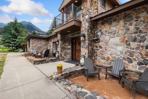 front ext 6 - Front Outdoor Lounge Space with Adirondack Chairs and Propane Fire pit.