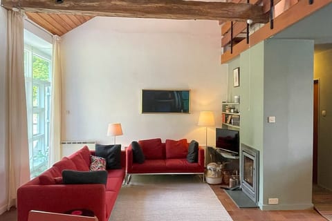 Double-height space open-plan living room.