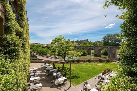 Floor-level terrace view of Carcassonne's fortified walls — the UNESCO site is a 2-minute walk.