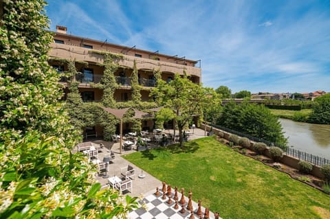 Welcome to Carcassonne — the terrace garden overlooks the Aude River, 100 metres from the UNESCO medieval city.