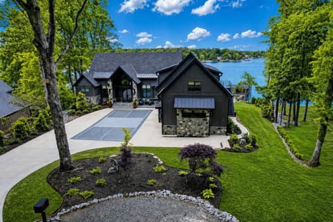 Stunning lakefront home, full size pickleball court for guest use.