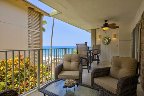 Large lanai offering close up views of surf and sun