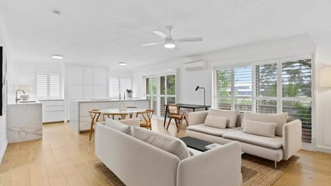 The open-plan living, dining, and kitchen area creates a welcoming space to relax and reconnect.