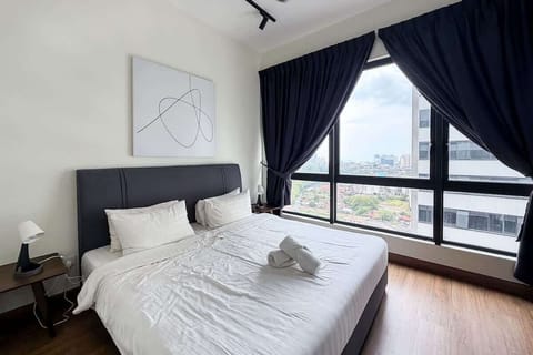 The master bedroom with a king sized bed and an en-suite.