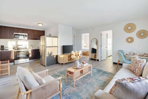 Relax in the bright, inviting living room, perfect for unwinding after a day of exploring.